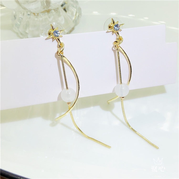 Elegant Octagram earrings featuring colorful beads and tassels, crafted from alloy and artificial rhinestones.