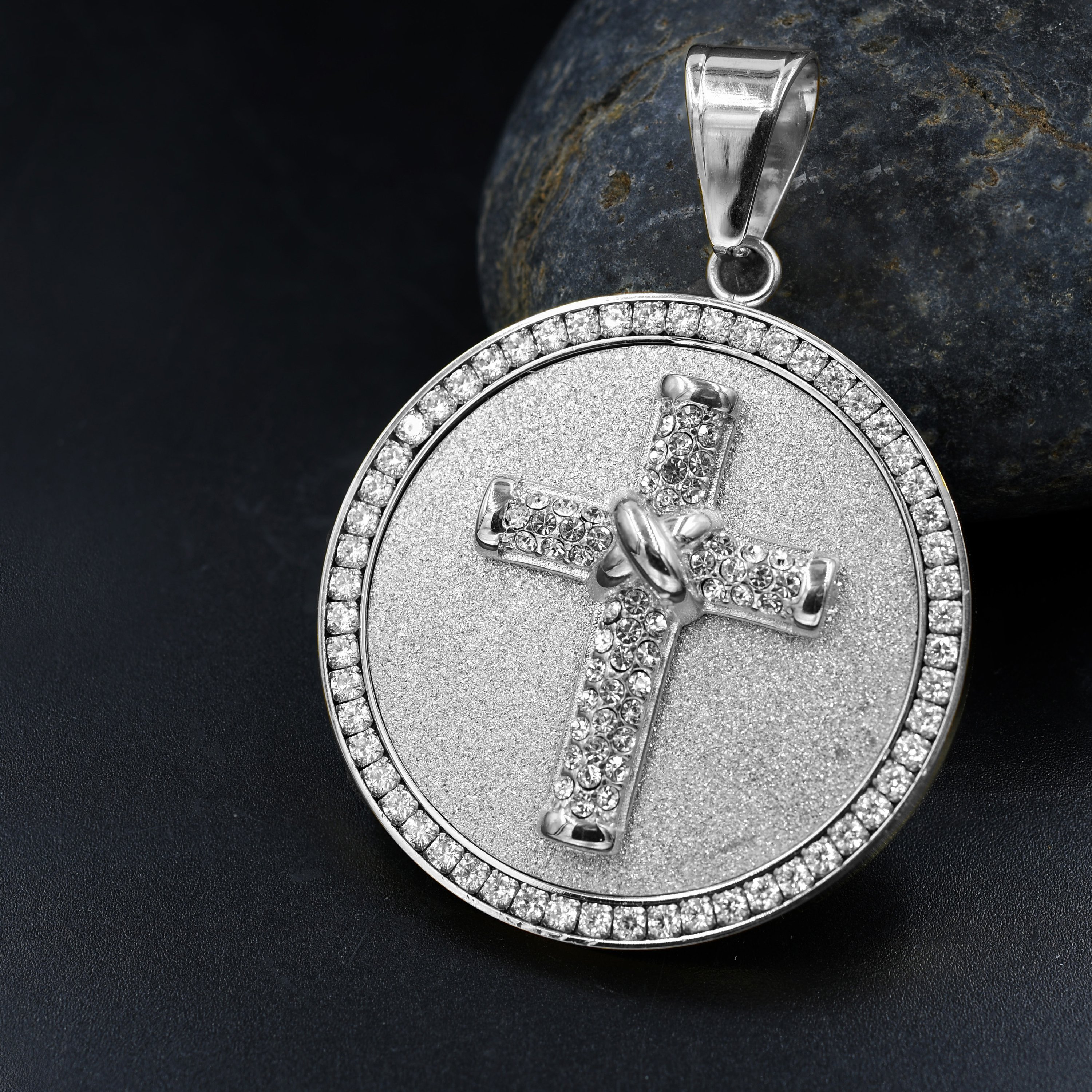 ODELAM Steel Pendant featuring a holy cross design, made of stainless steel with cubic zirconia accents, elegantly packaged.