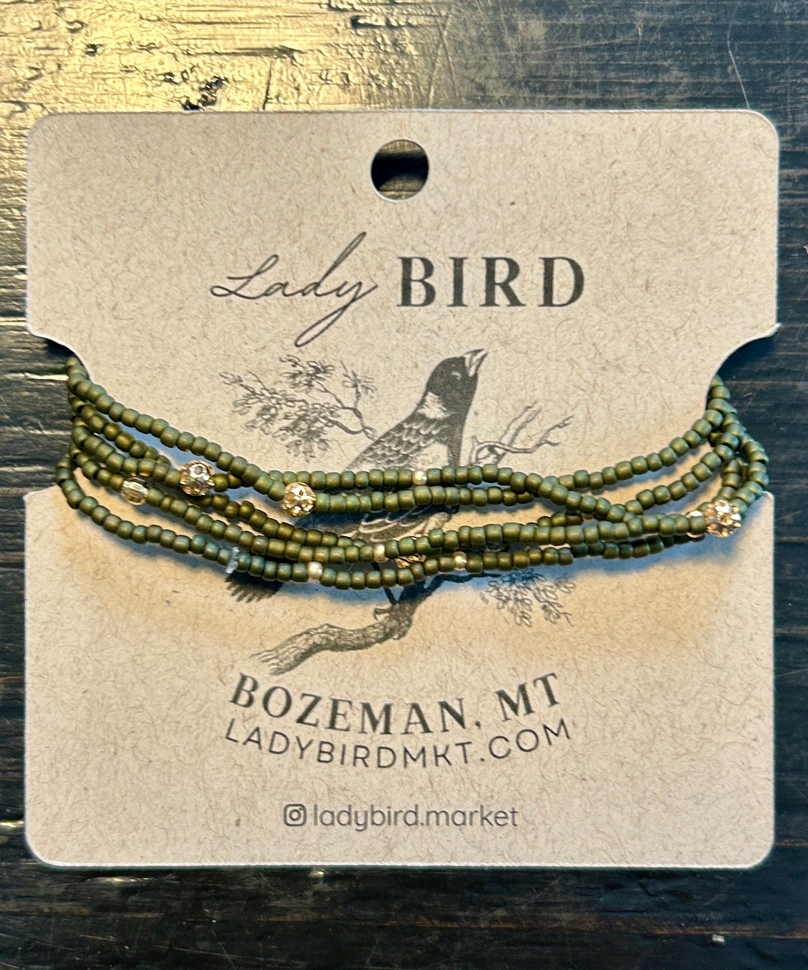 Olive green and gold or silver sprinkled beaded boho wrap bracelet, showcasing Czech glass seed beads and metallic accents.