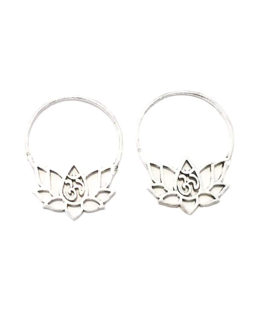 A pair of handcrafted Om Lotus Flower Earrings featuring a lotus design with the Om symbol in the center, made from brass and silver.