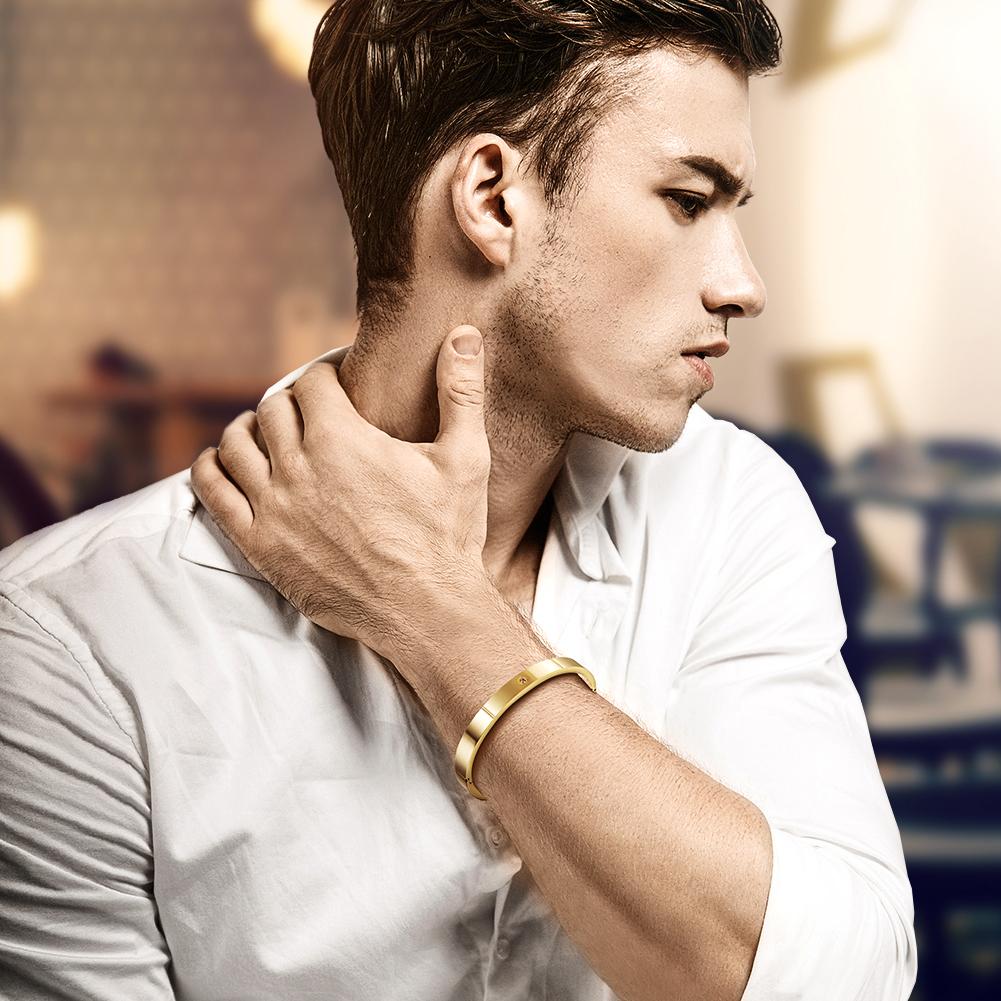 Elegant One Stone Bangle made of 316L surgical stainless steel with 14K gold PVD plating, showcasing its sleek design and luxurious finish.