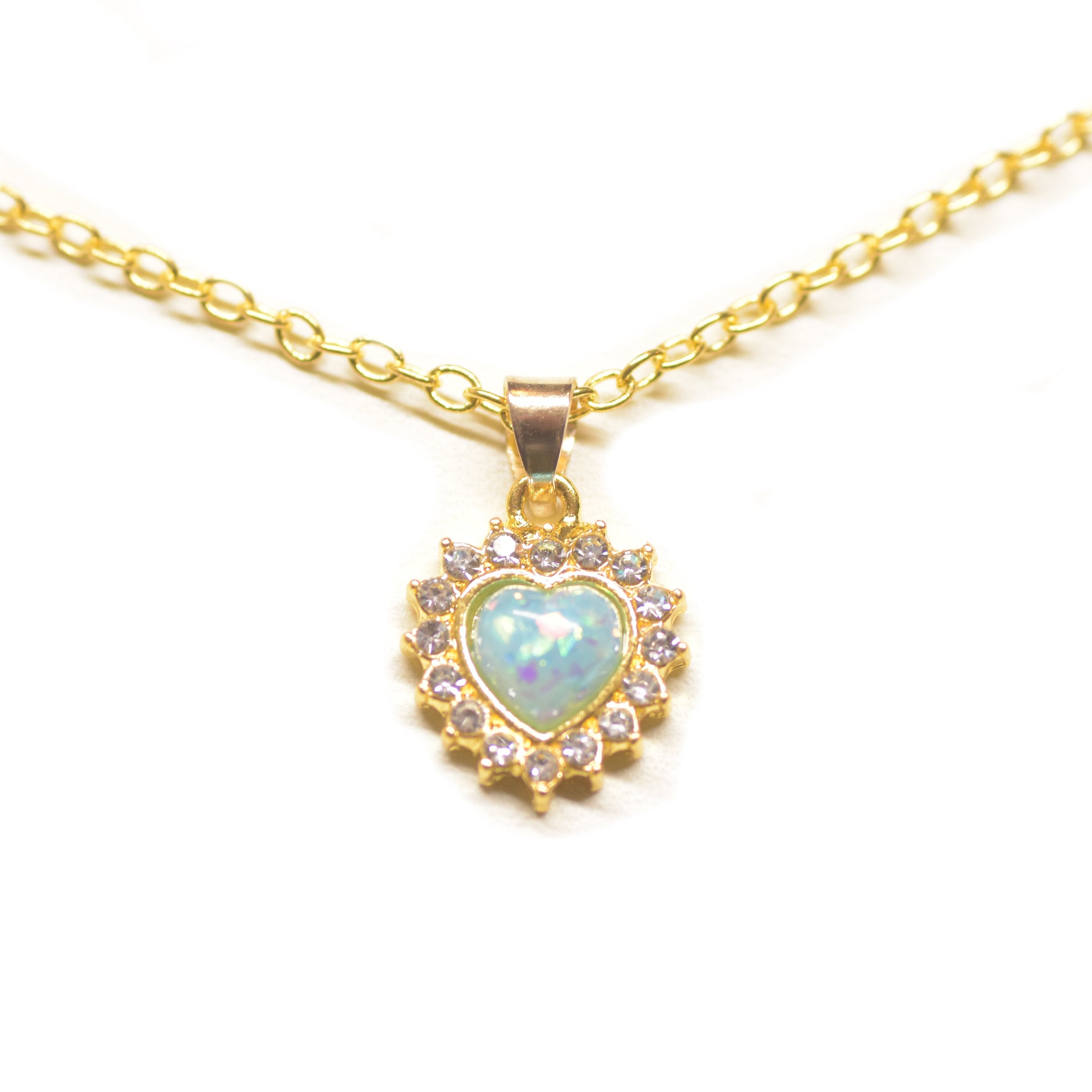 Opal Created Heart Necklace with Crystals, 18-inch length, 14K gold plated, featuring a heart design with sparkling crystals.