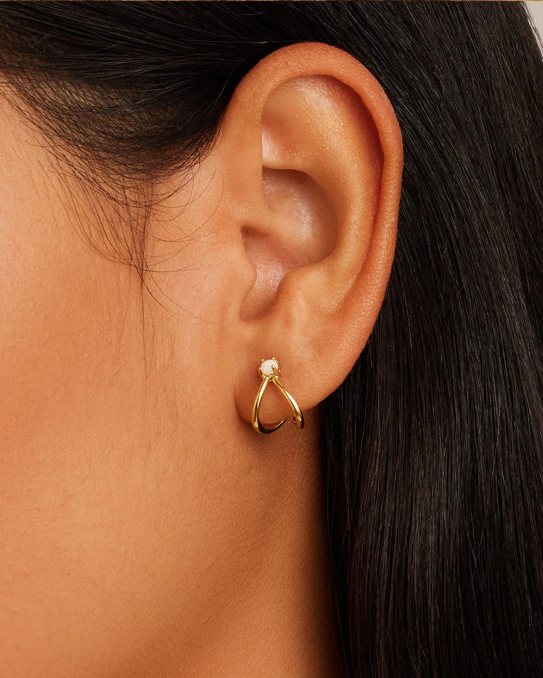 Opalite Solitaire Double Huggies in 14k gold, showcasing elegant opalite stones.