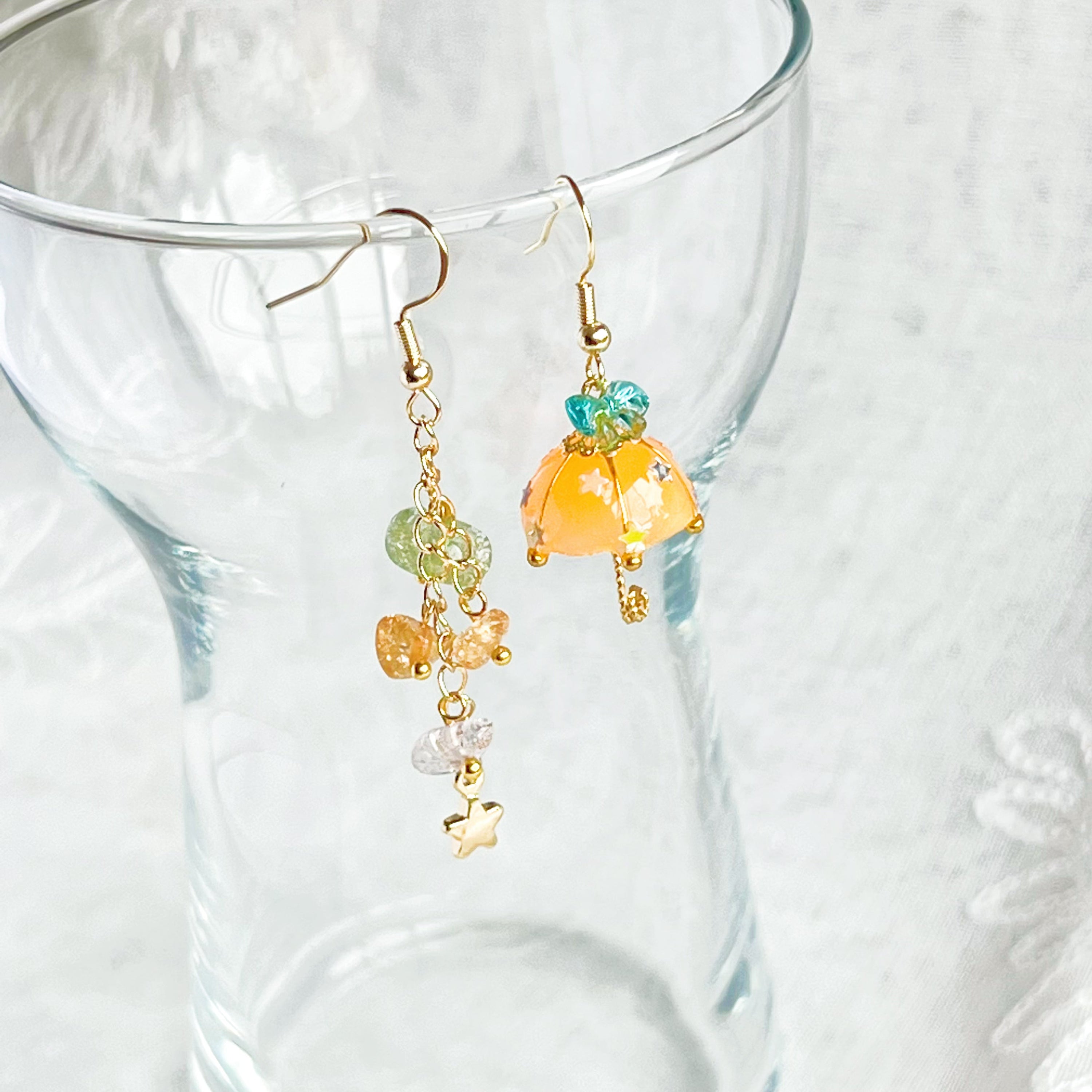 Colorful Orange with Blue Bow Umbrella earrings featuring rainbow stones, handmade with gold plated sterling silver ear wires.