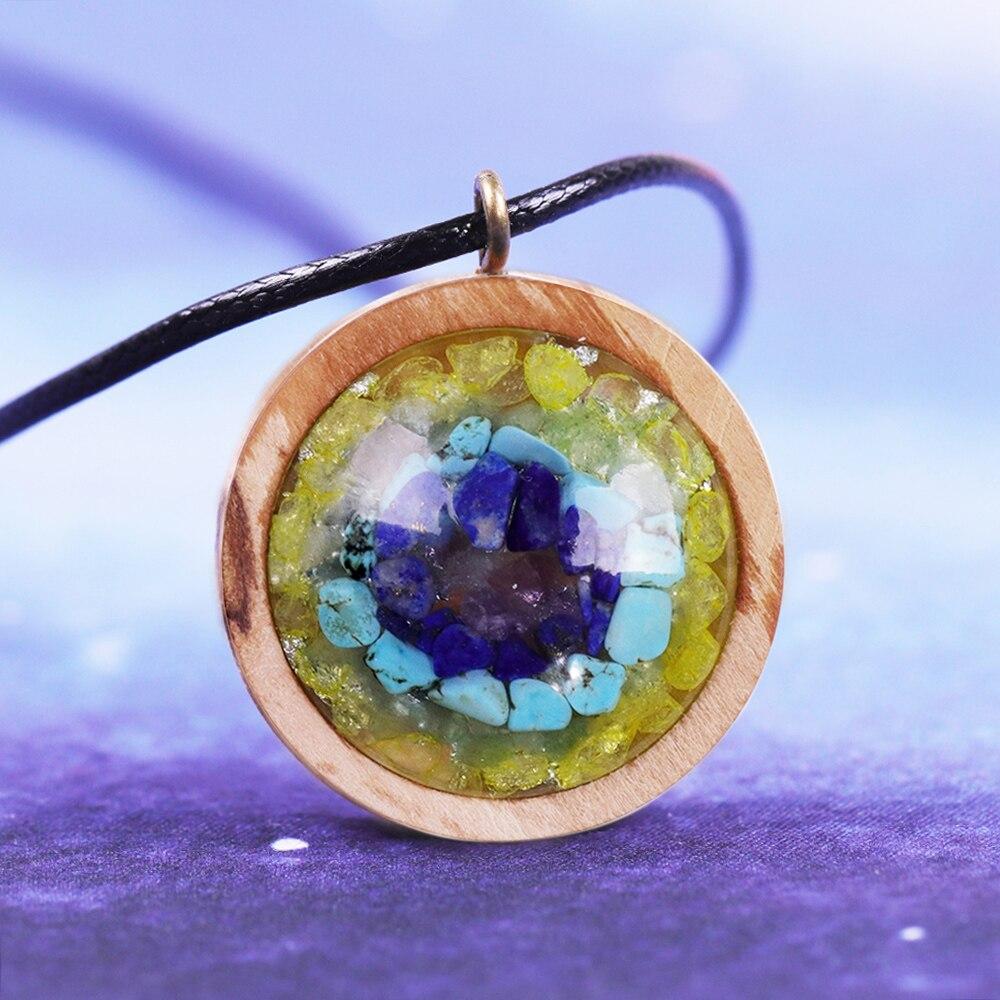 A stylish Orgon Necklace featuring a natural crystal energy pendant made from various gemstones, perfect for yoga and meditation.