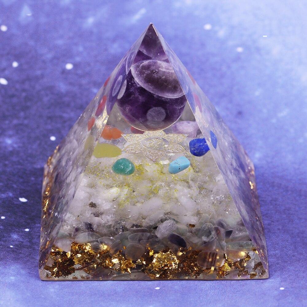 A beautifully handcrafted Orgonite Amethyst Pyramid featuring natural stones like amethyst and fluorite, designed to enhance energy flow.