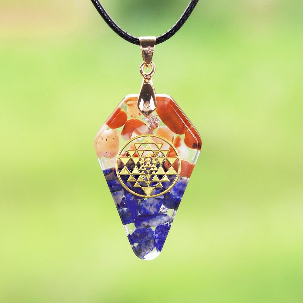 A beautifully crafted Orgonite Pendant featuring the Sri Yantra design, made from resin, southern red agate, lapis lazuli, and copper, hanging on a trendy rope chain.