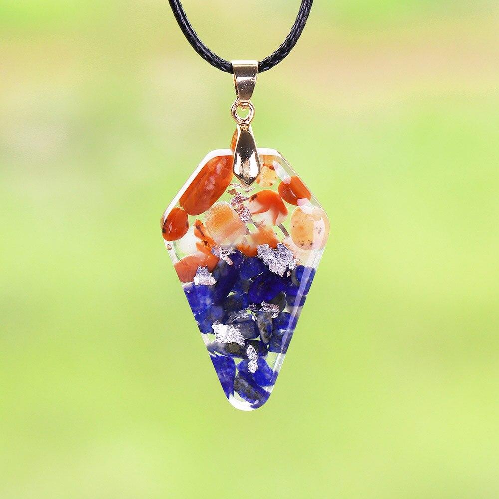 A beautifully crafted Orgonite Pendant featuring the Sri Yantra design, made from resin, southern red agate, lapis lazuli, and copper, hanging on a trendy rope chain.