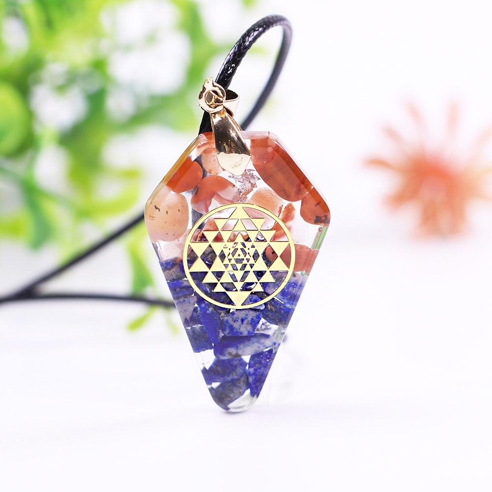 A beautifully crafted Orgonite Pendant featuring the Sri Yantra design, made from resin, southern red agate, lapis lazuli, and copper, hanging on a trendy rope chain.