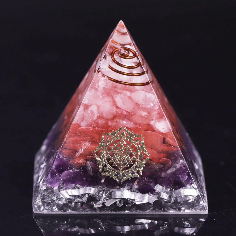 A beautifully crafted Orgonite Pyramid featuring amethyst, rose quartz, and copper, designed for positive energy and EMF protection.