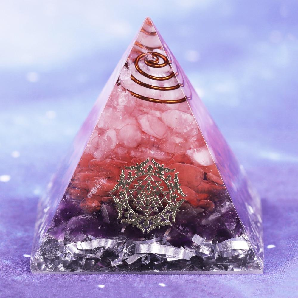A beautifully crafted Orgonite Pyramid featuring amethyst, rose quartz, and copper, designed for positive energy and EMF protection.