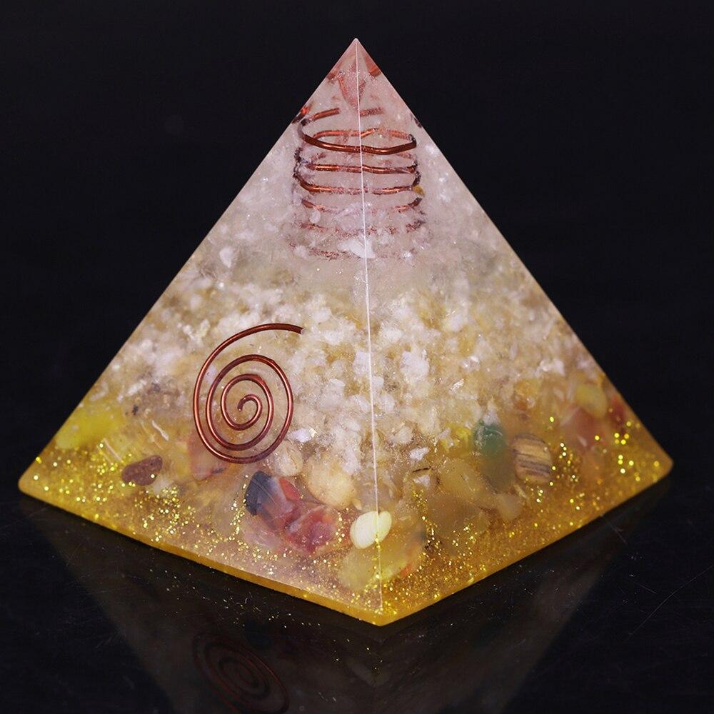 A beautifully crafted Orgonite Pyramid made from natural stones, resin, and copper, designed to enhance energy flow and attract positive vibrations.