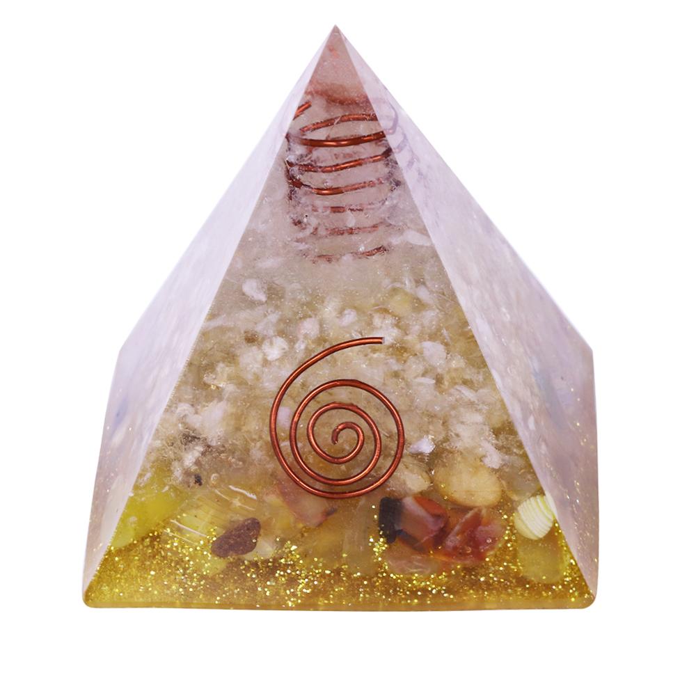 A beautifully crafted Orgonite Pyramid made from natural stones, resin, and copper, designed to enhance energy flow and attract positive vibrations.