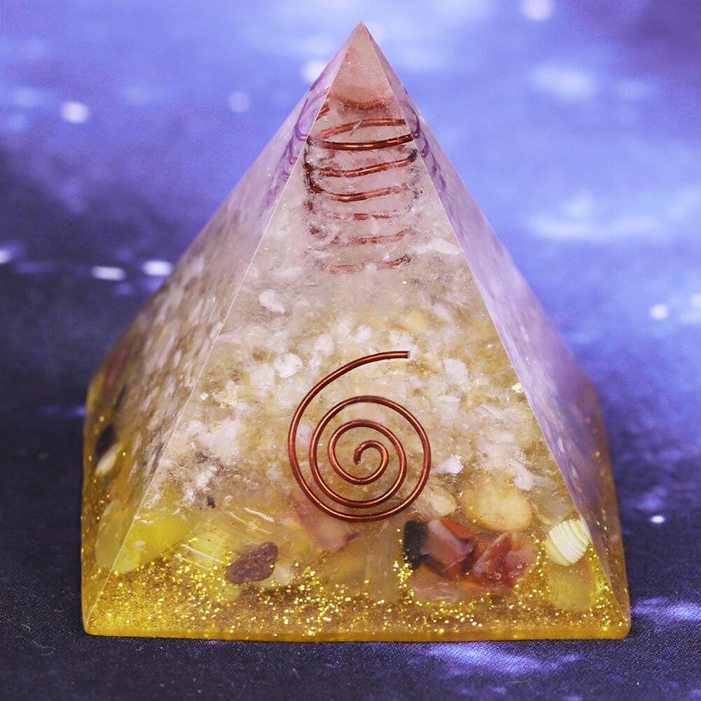 A beautifully crafted Orgonite Pyramid made from natural stones, resin, and copper, designed to enhance energy flow and attract positive vibrations.
