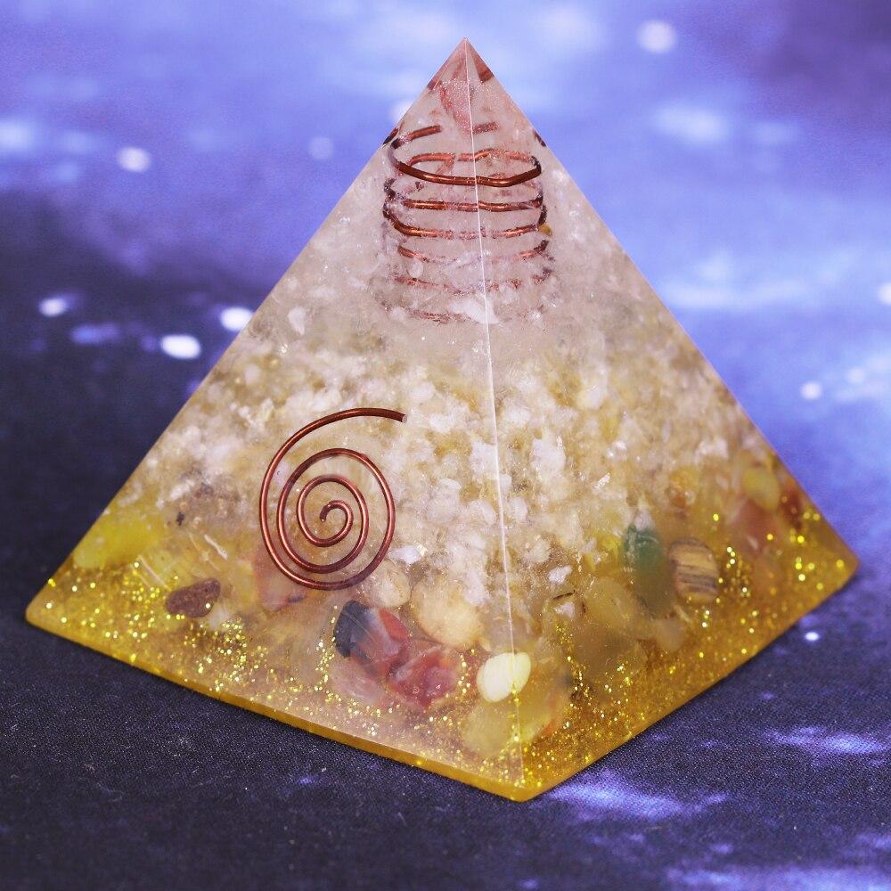 A beautifully crafted Orgonite Pyramid made from natural stones, resin, and copper, designed to enhance energy flow and attract positive vibrations.