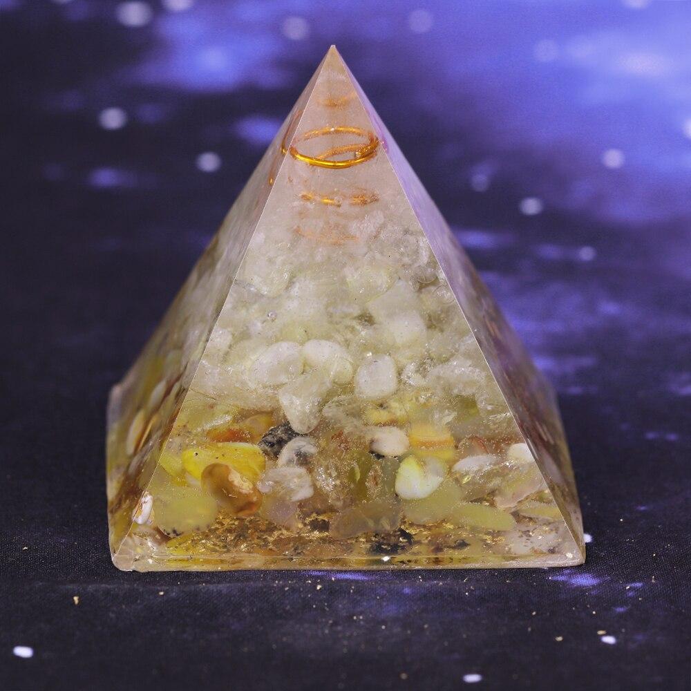 A beautifully handcrafted Orgonite Pyramid made from natural stones, resin, and copper, designed for EMF protection and chakra healing.
