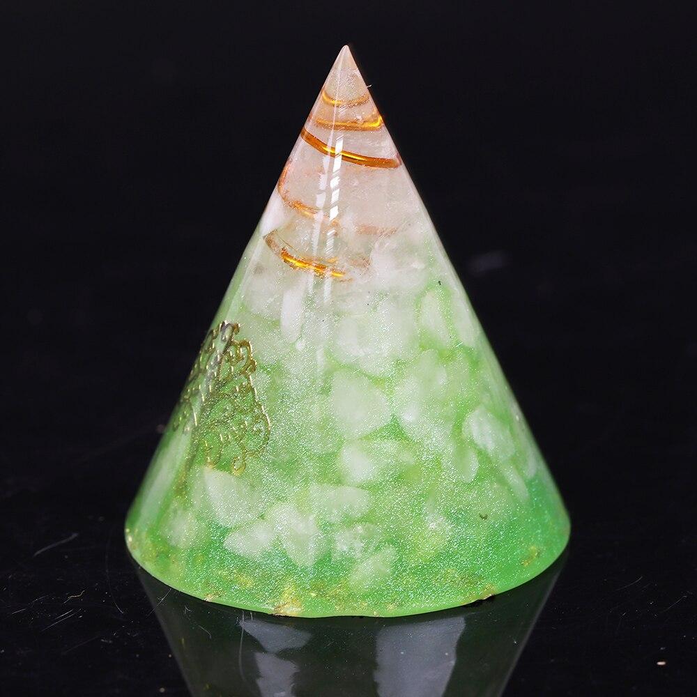 Orgonite Pyramid made of natural white crystal, resin, copper, and gold foil, designed for EMF protection and chakra healing.
