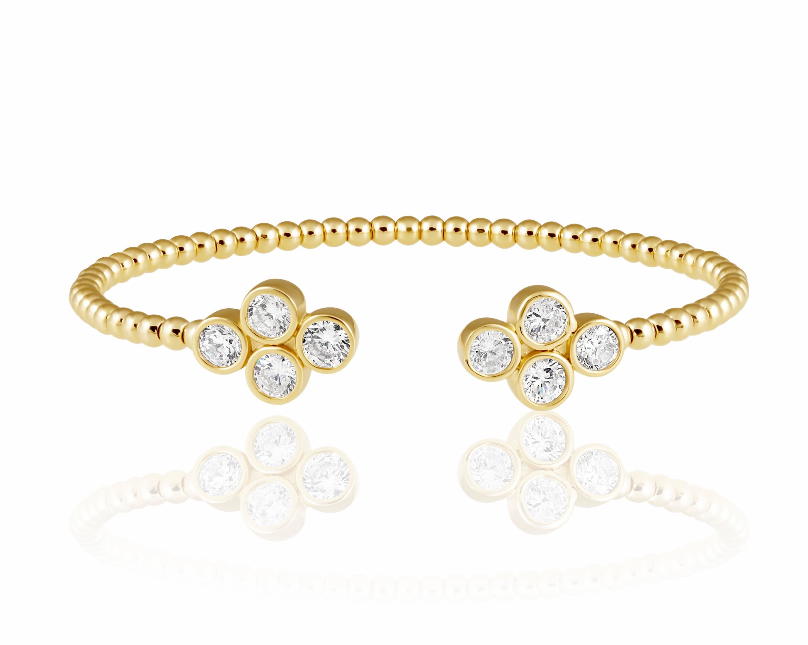 Oriana Flower Cuff featuring 18k plated stainless steel with sparkling CZ flowers, elegantly designed for stylish wear.