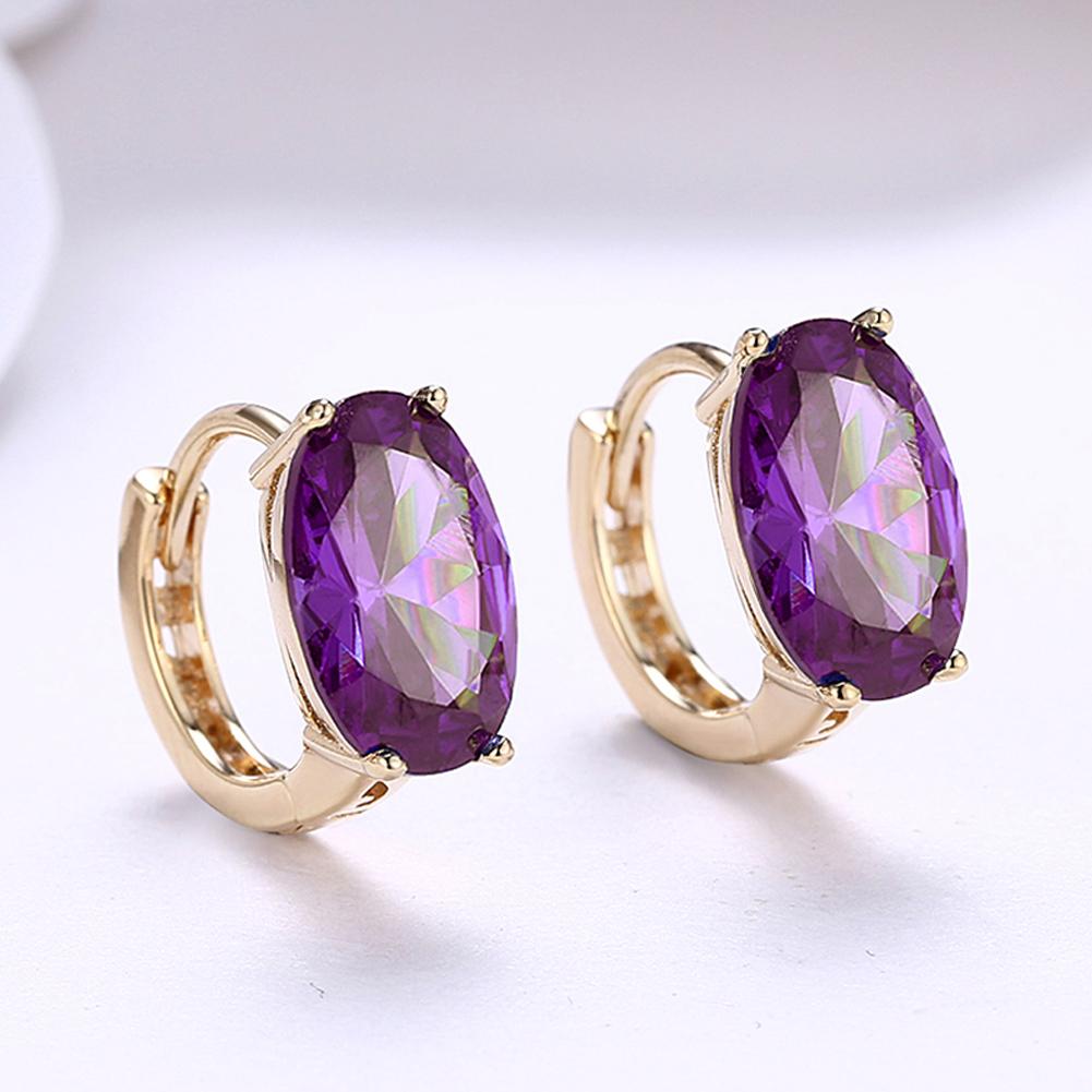 Elegant oval cut purple clip-on earrings in 14K gold, featuring certified crystals and a hypoallergenic design.