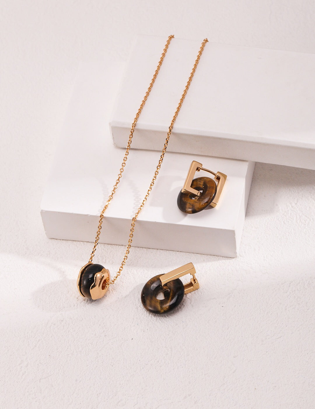 Handmade Oval Tiger Eye Stone Pendant Necklace with gold vermeil chain, showcasing its unique natural beauty and elegant design.