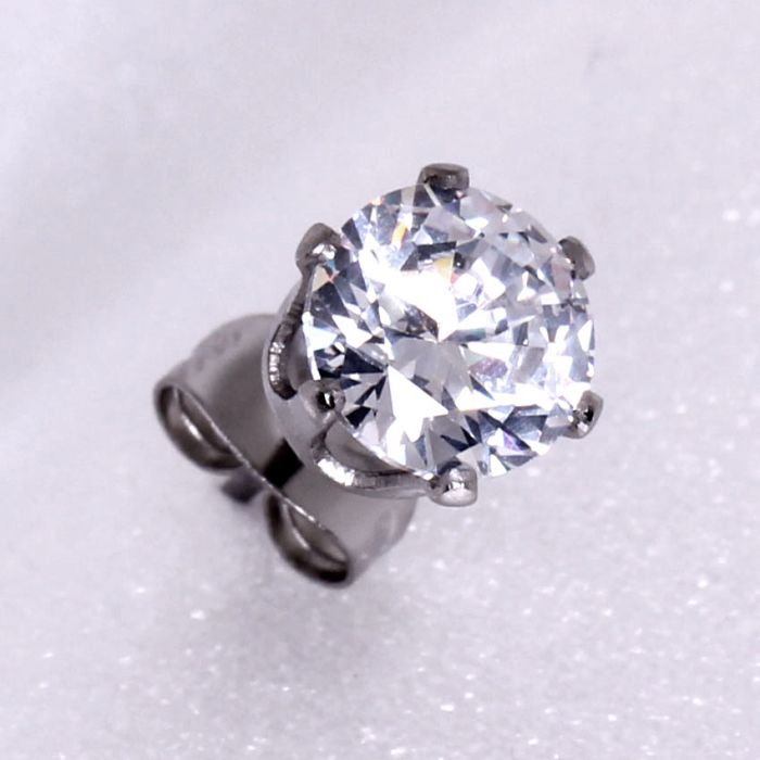 A pair of 316L surgical steel clear round CZ stud earrings featuring sparkling cubic zirconia stones set in a durable metal frame.