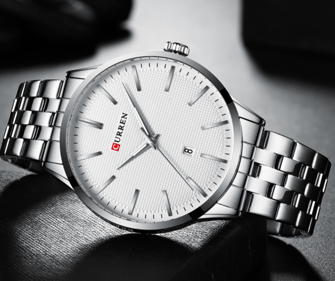 PAMOLA Metal Watch I 550901 featuring a round dial, stainless steel wristband, and Curren logo, showcasing elegance and style.