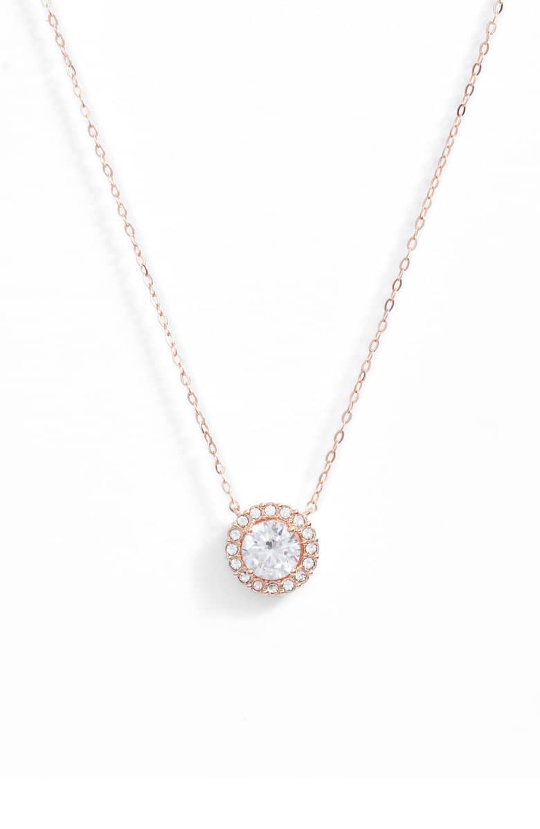Pave Halo Disc Necklace and Stud Earring set featuring Austrian crystals in a luxe gift box, showcasing elegant rose gold plating.