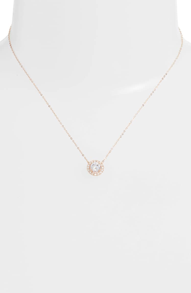 Pave Halo Disc Necklace and Stud Earring set featuring Austrian crystals in a luxe gift box, showcasing elegant rose gold plating.