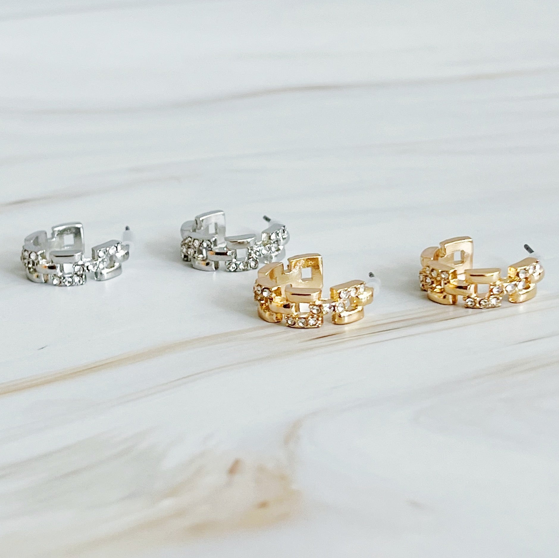 Elegant Pave Huggie Hoop Earrings with sparkling pave detailing, designed for comfort and style.