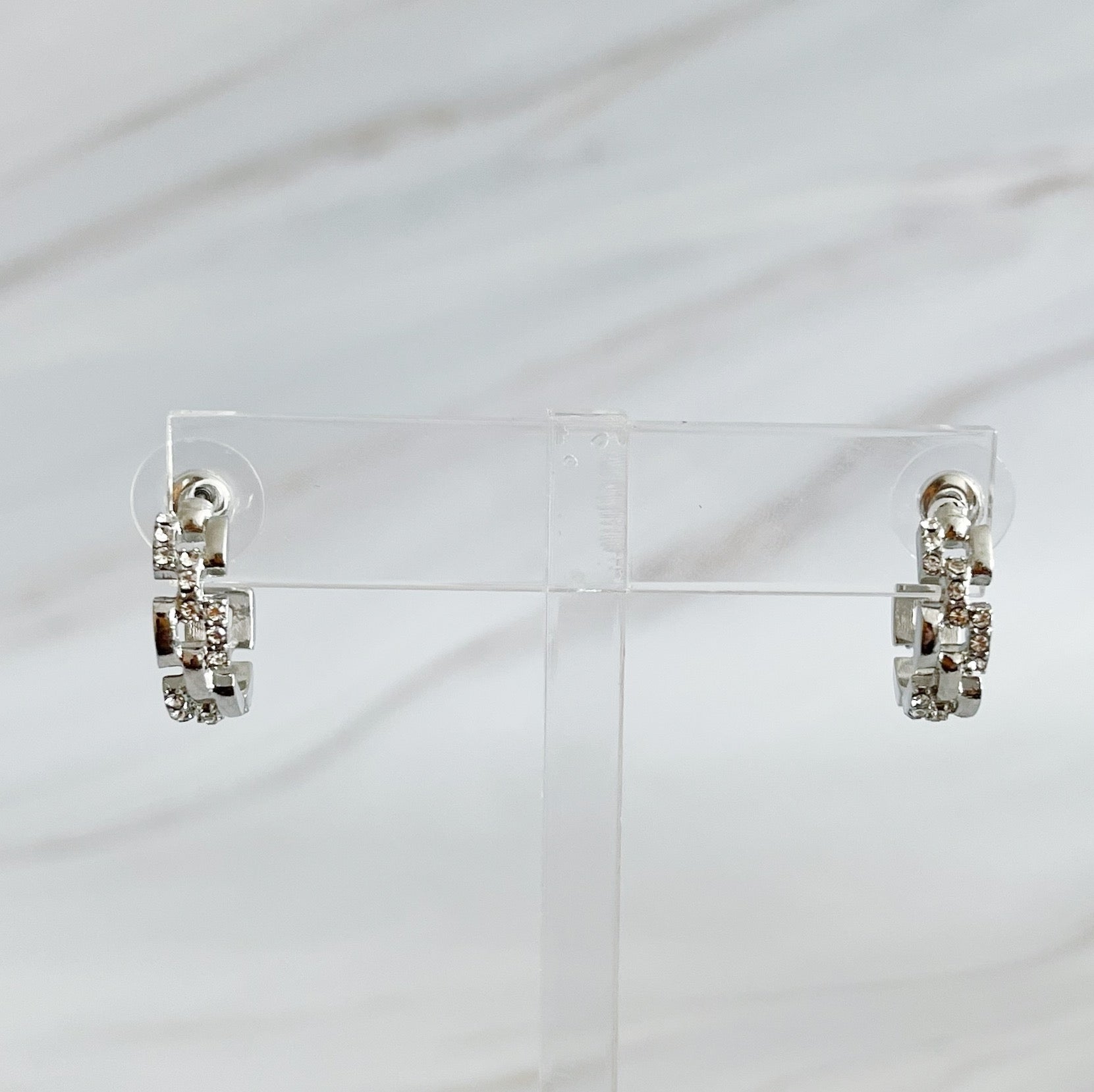 Elegant Pave Huggie Hoop Earrings with sparkling pave detailing, designed for comfort and style.