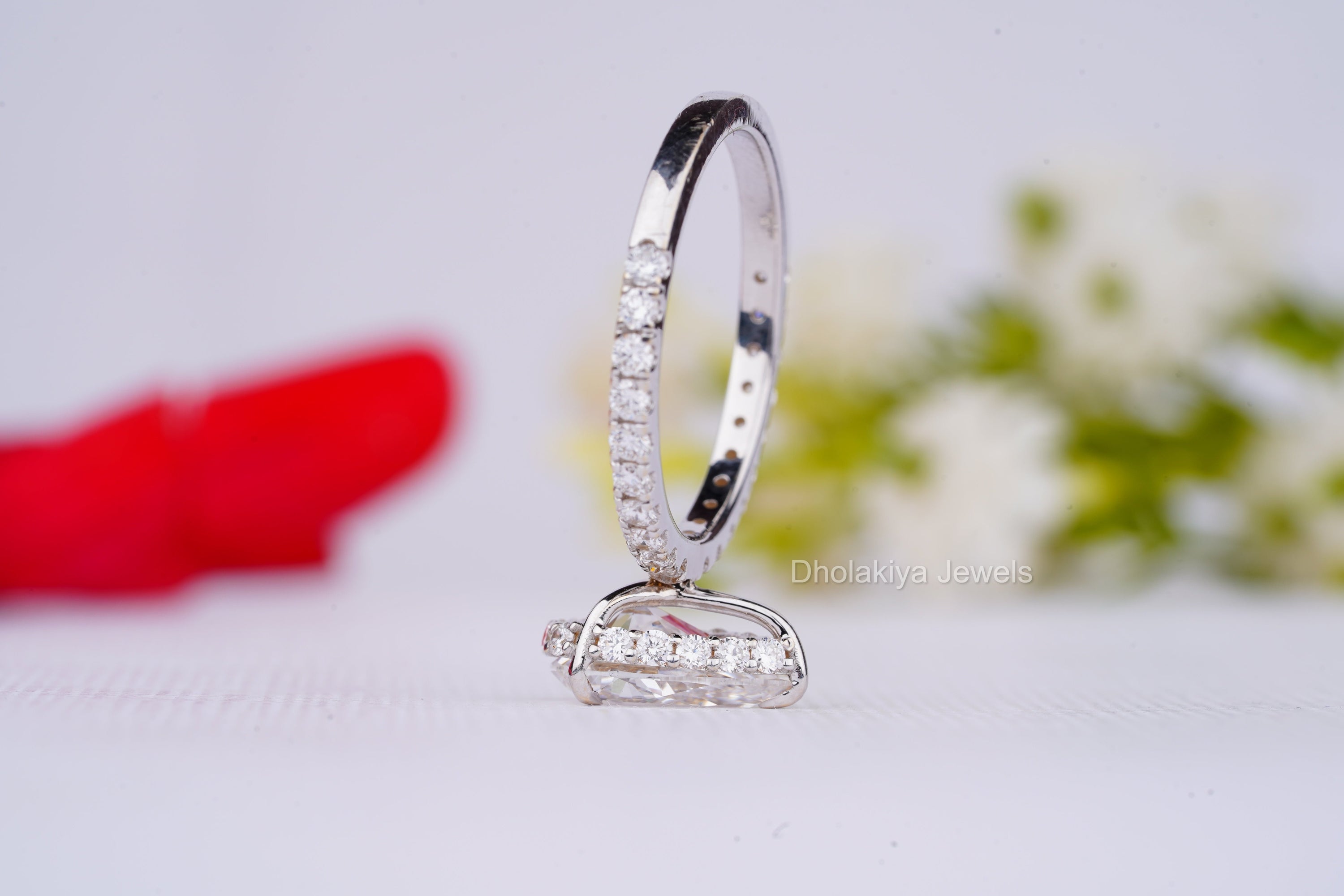 Elegant Pear Cut Lab Grown Diamond Ring with a 2 CT diamond, showcasing its unique shape and brilliant sparkle.