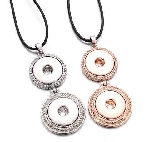 A beautiful two-snap pendant necklace in silver and rose gold, featuring a matching black cord and customizable snap options.