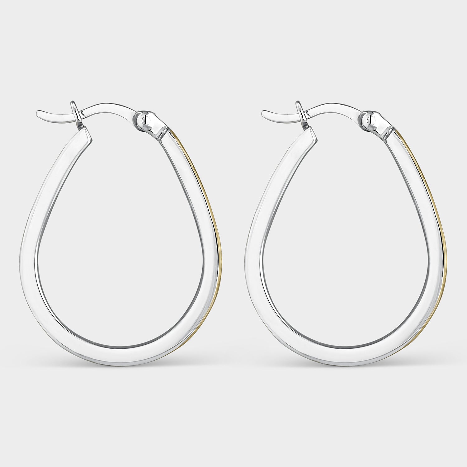 Pendientes aros bicolor en forma de gota, con baño de oro amarillo de 18K y textura mate, tamaño 25mm, ideales para cualquier ocasión.