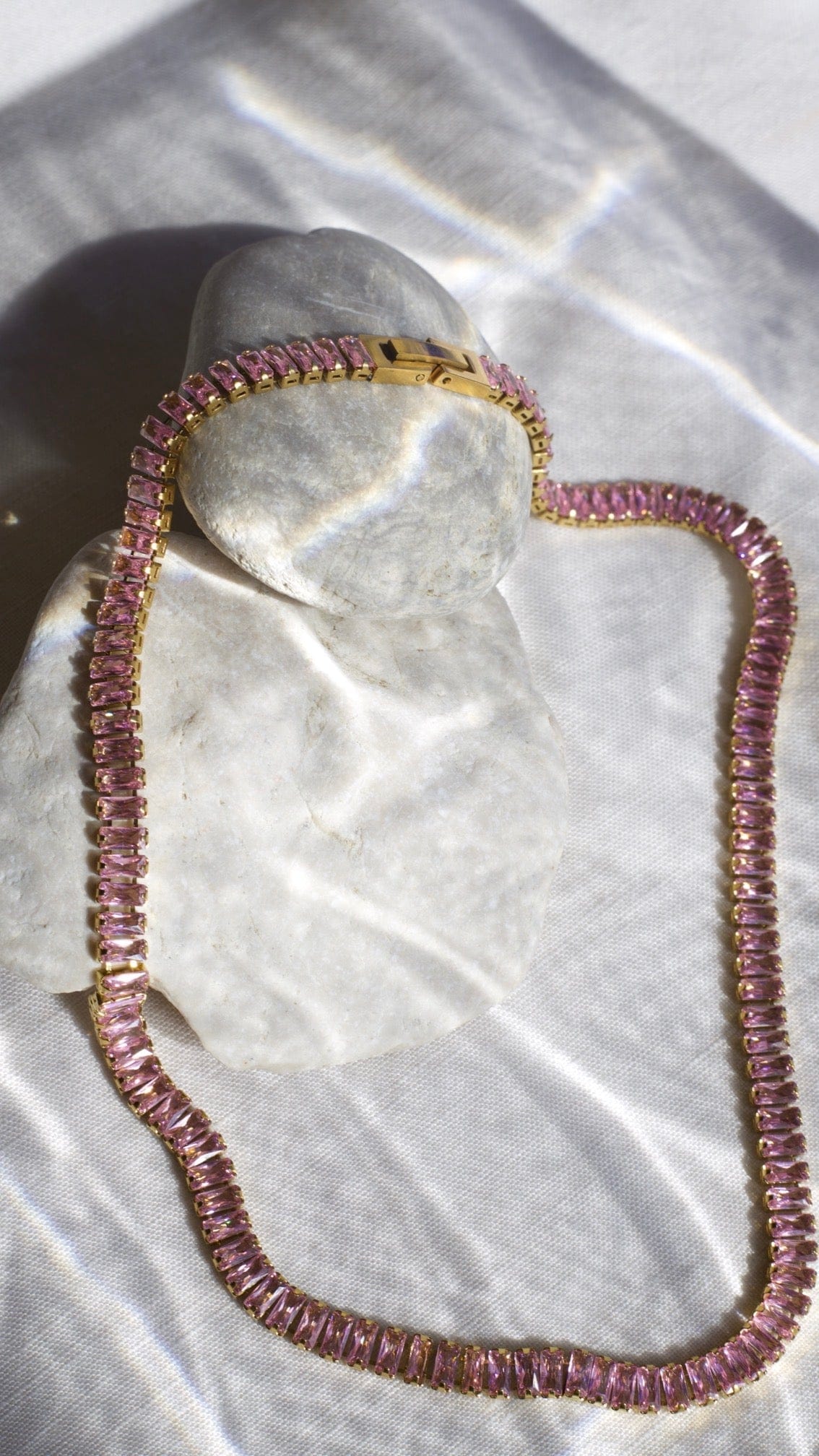 Penelope Crystal Choker Necklace featuring multi-coloured CZ crystals and 18K gold plating on a stainless steel chain.