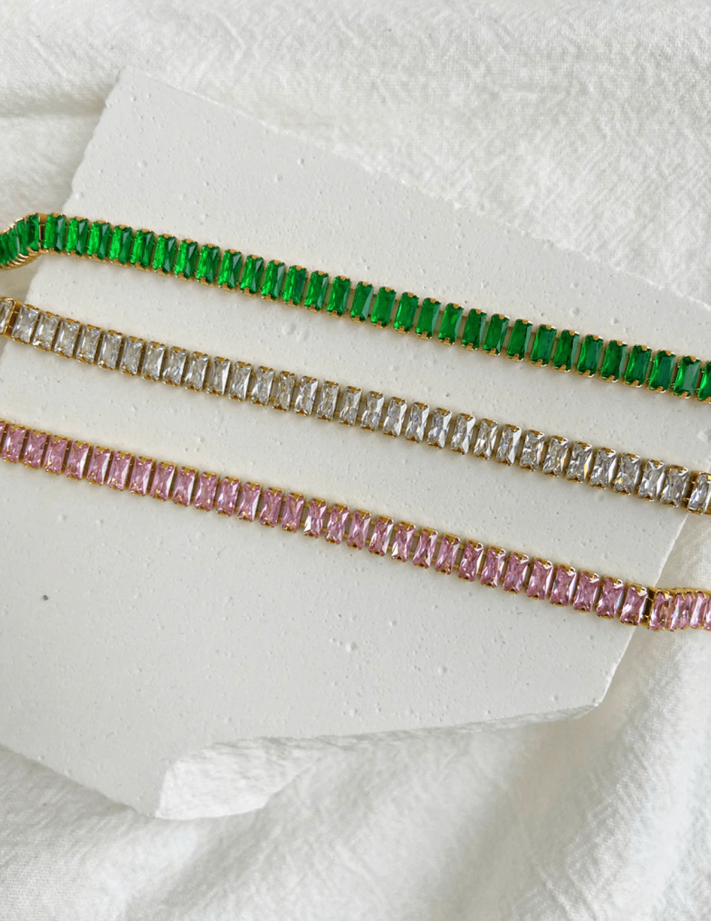 Penelope Crystal Choker Necklace featuring multi-coloured CZ crystals and 18K gold plating on a stainless steel chain.