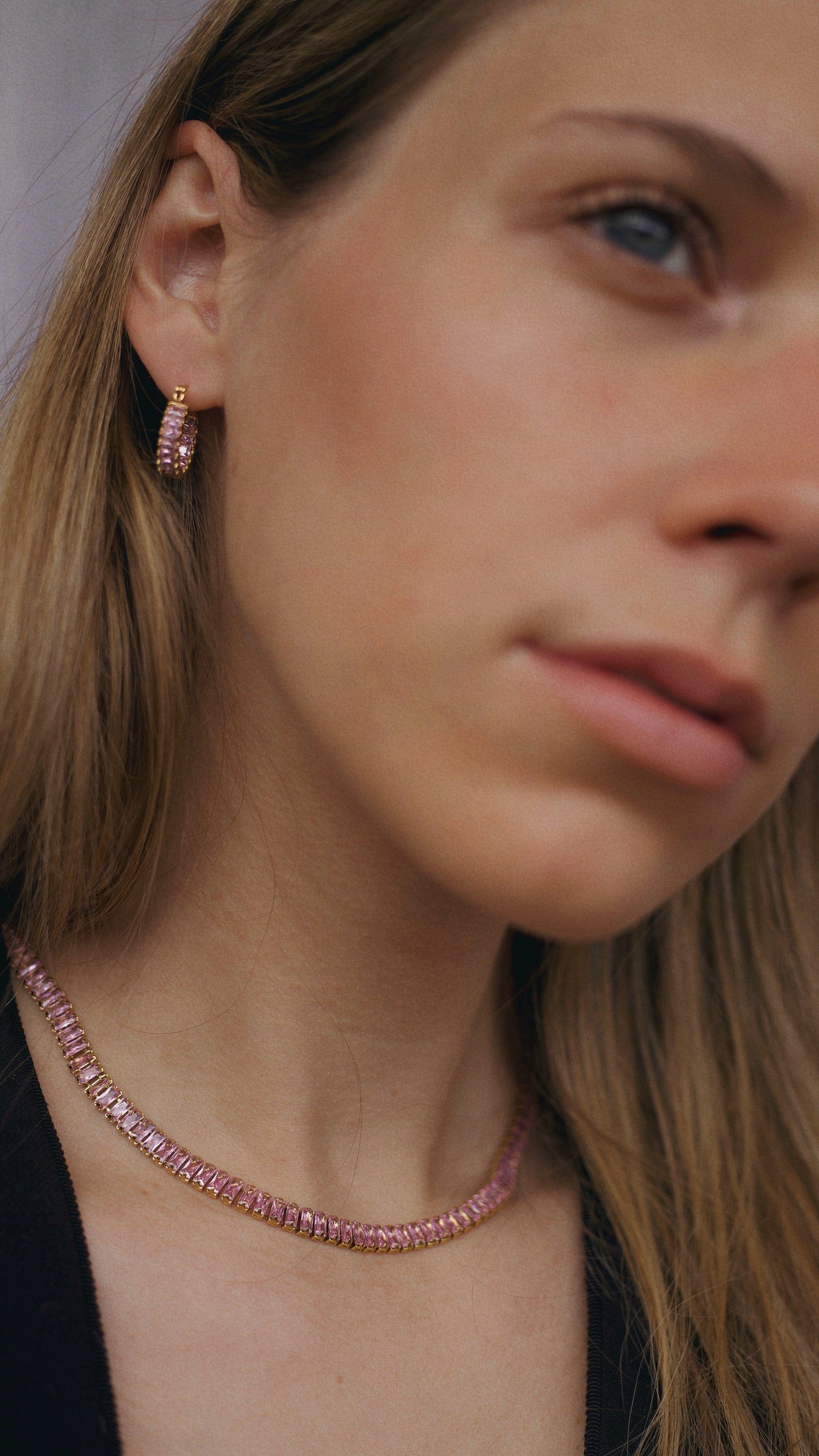 Penelope Crystal Choker Necklace featuring multi-coloured CZ crystals and 18K gold plating on a stainless steel chain.
