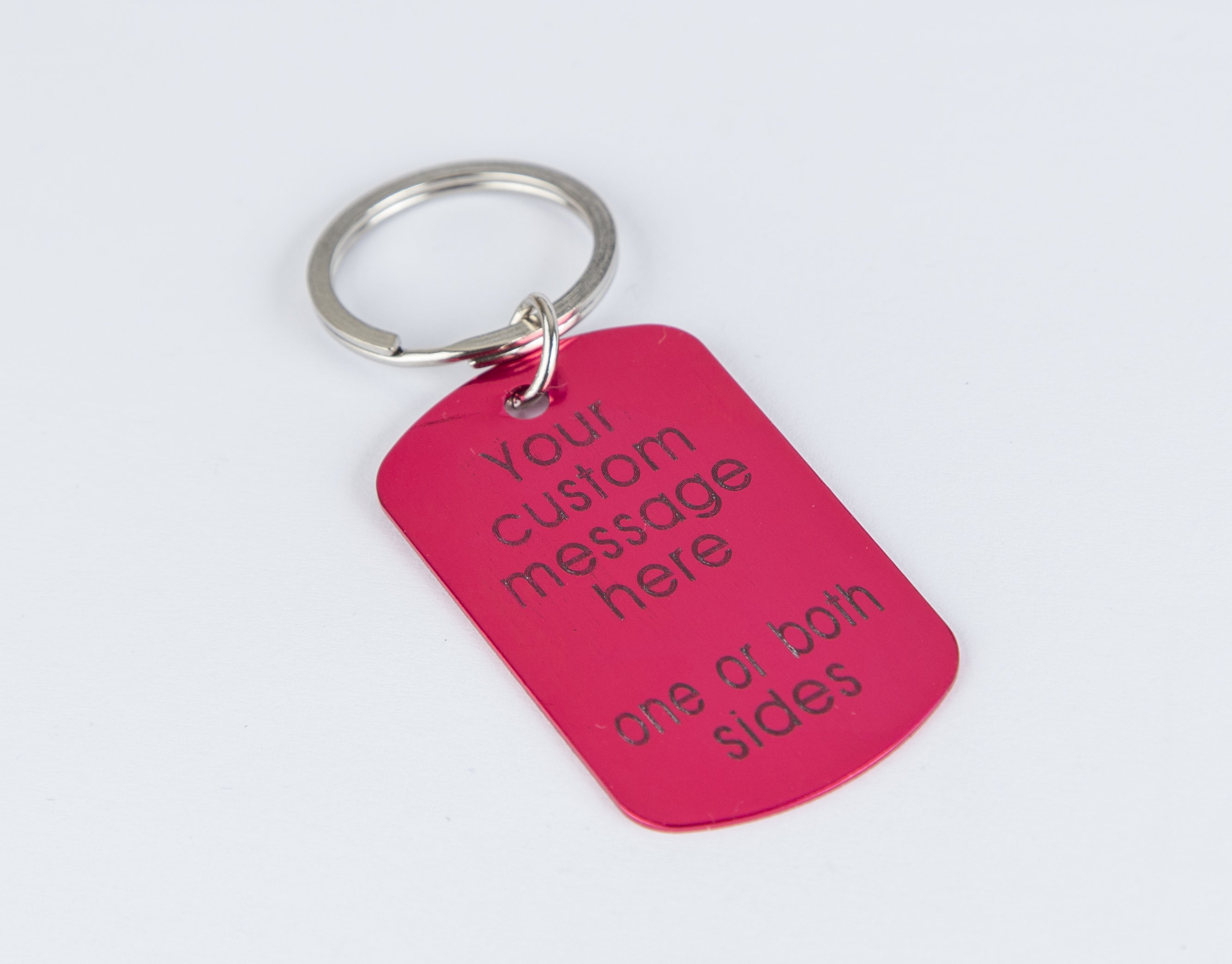 Personalized engraved pink keychain with a lightweight aluminum tag and stainless steel keyring, showcasing custom text.