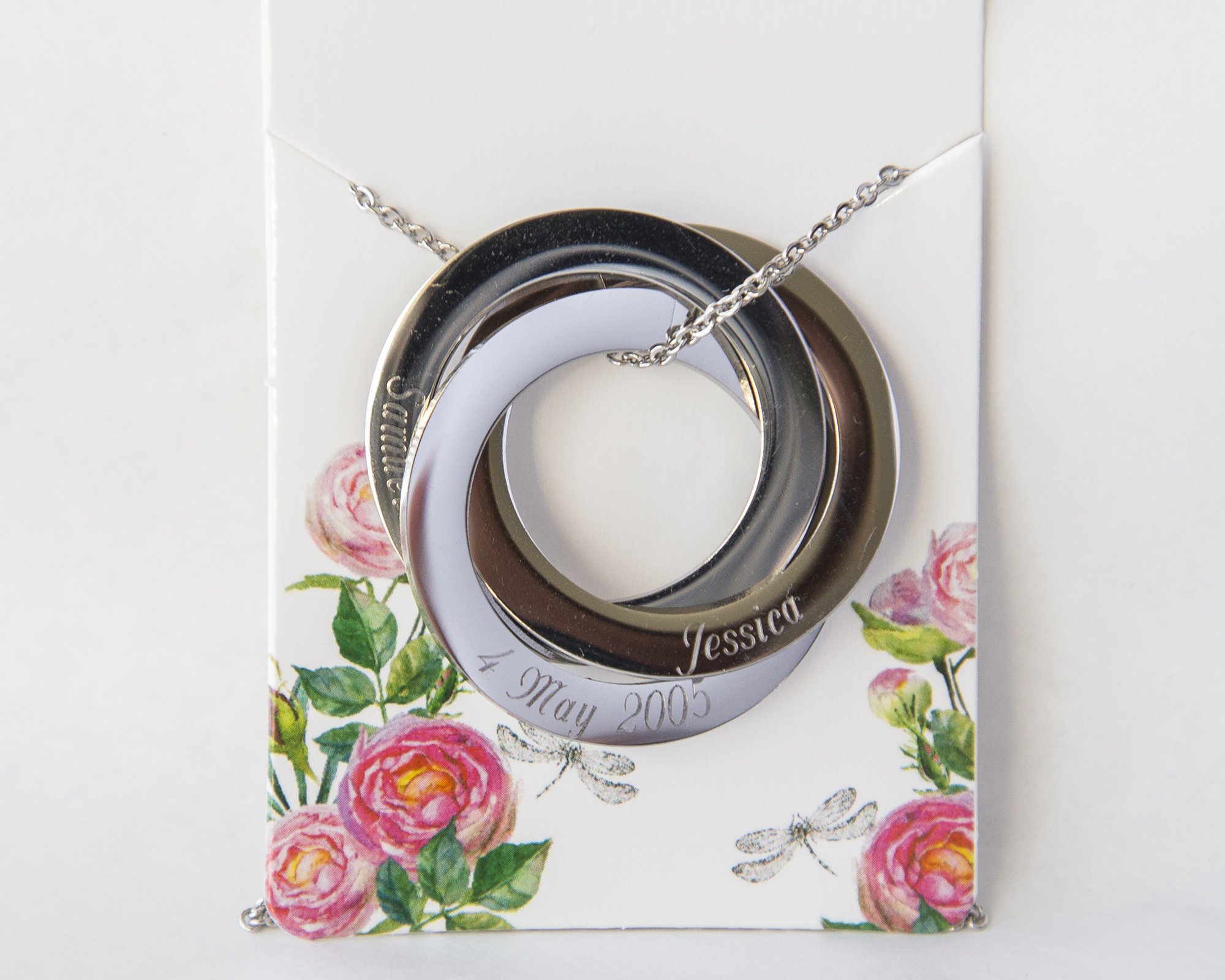 Personalized Rings Name Necklace featuring interlocked stainless steel rings with custom engravings.