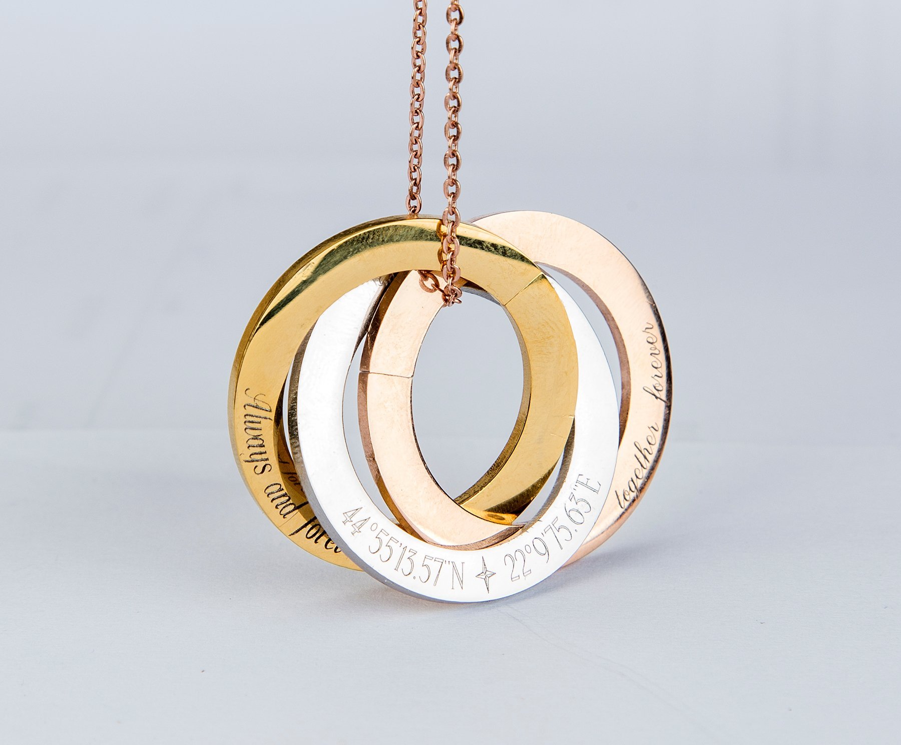 Personalized Russian Rings Eternity Necklace featuring interlocked rings with custom engravings, available in stainless steel and gold plating.