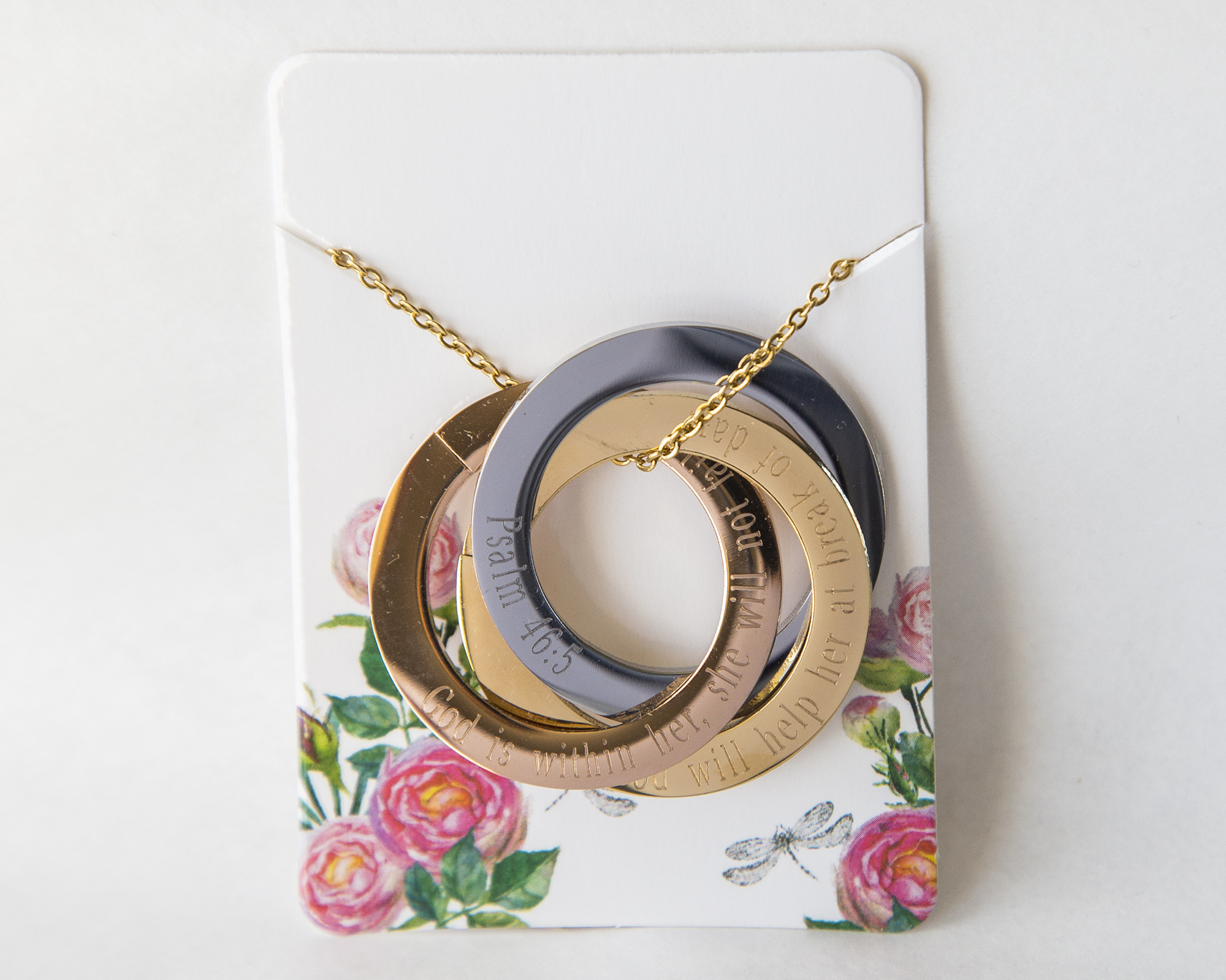 Personalized Scripture Rings Necklace featuring three interlocking rings, customizable engravings, and a stainless steel chain.