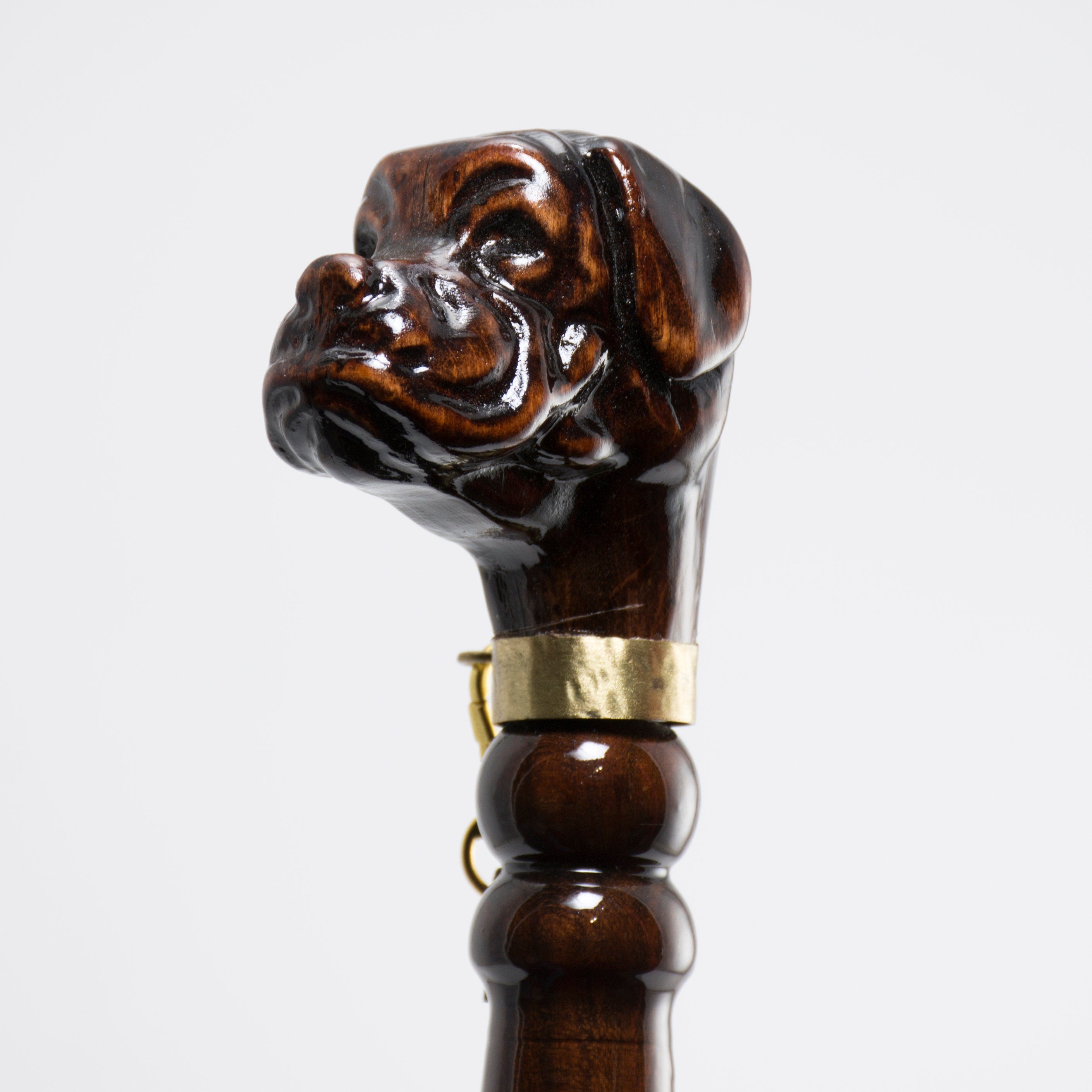 Personalized 28.5-inch wooden shoe horn with a boxer dog head design, crafted from high-quality materials including wood, brass, and leather.