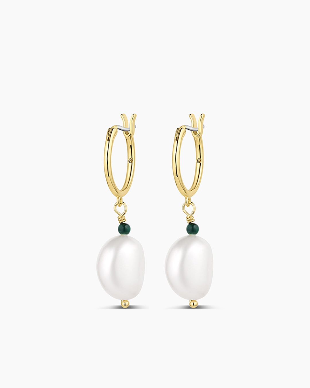 Elegant Phoebe Pearl Huggies made of 14k gold featuring beautiful pearl accents, perfect for any occasion.