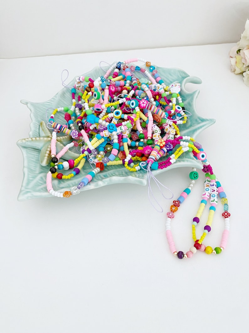 Colorful Rainbow Evil Eye Phone Charm Strap with vibrant beads and protective evil eye design, perfect for stylish phone accessories.