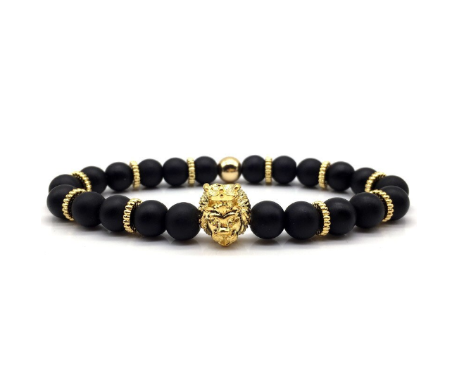 Poised Steel Bracelet featuring black lava stone beads and a gold lion head centerpiece, elegantly designed for a sophisticated look.