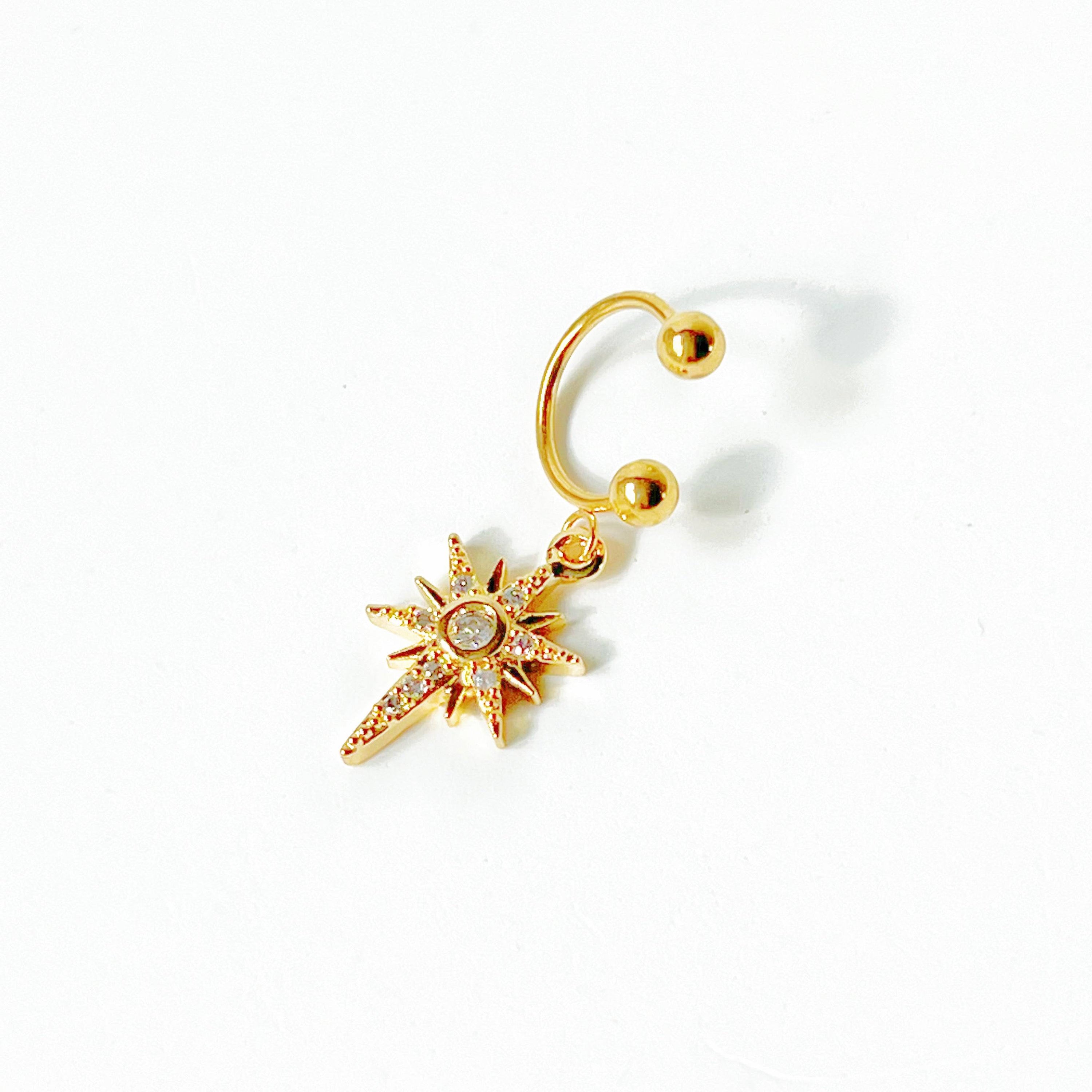Pole Star Drop Ear Cuff earring featuring a pole star design with clear zircon crystals, crafted from gold-plated bronze.