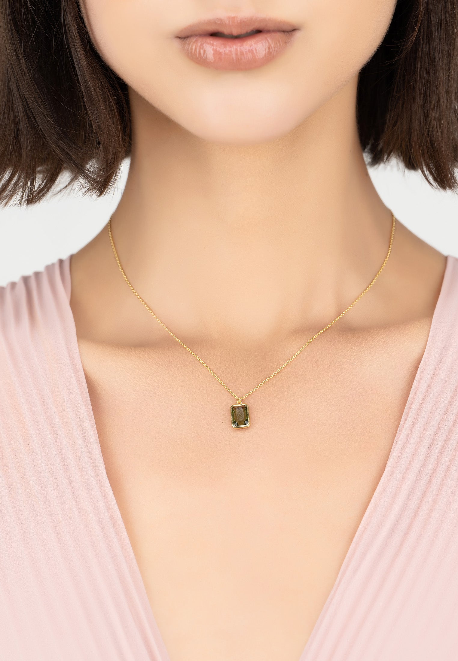 Portofino Necklace featuring a vibrant peridot gemstone set in gold-plated sterling silver, elegantly designed for stylish wear.