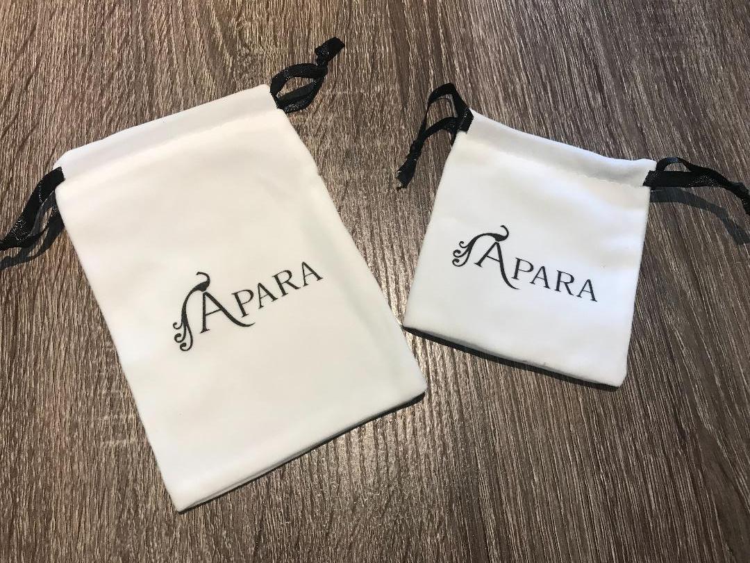 A stylish Pretty Bracelet displayed elegantly in a velvet pouch, showcasing its unique design and vibrant colors.