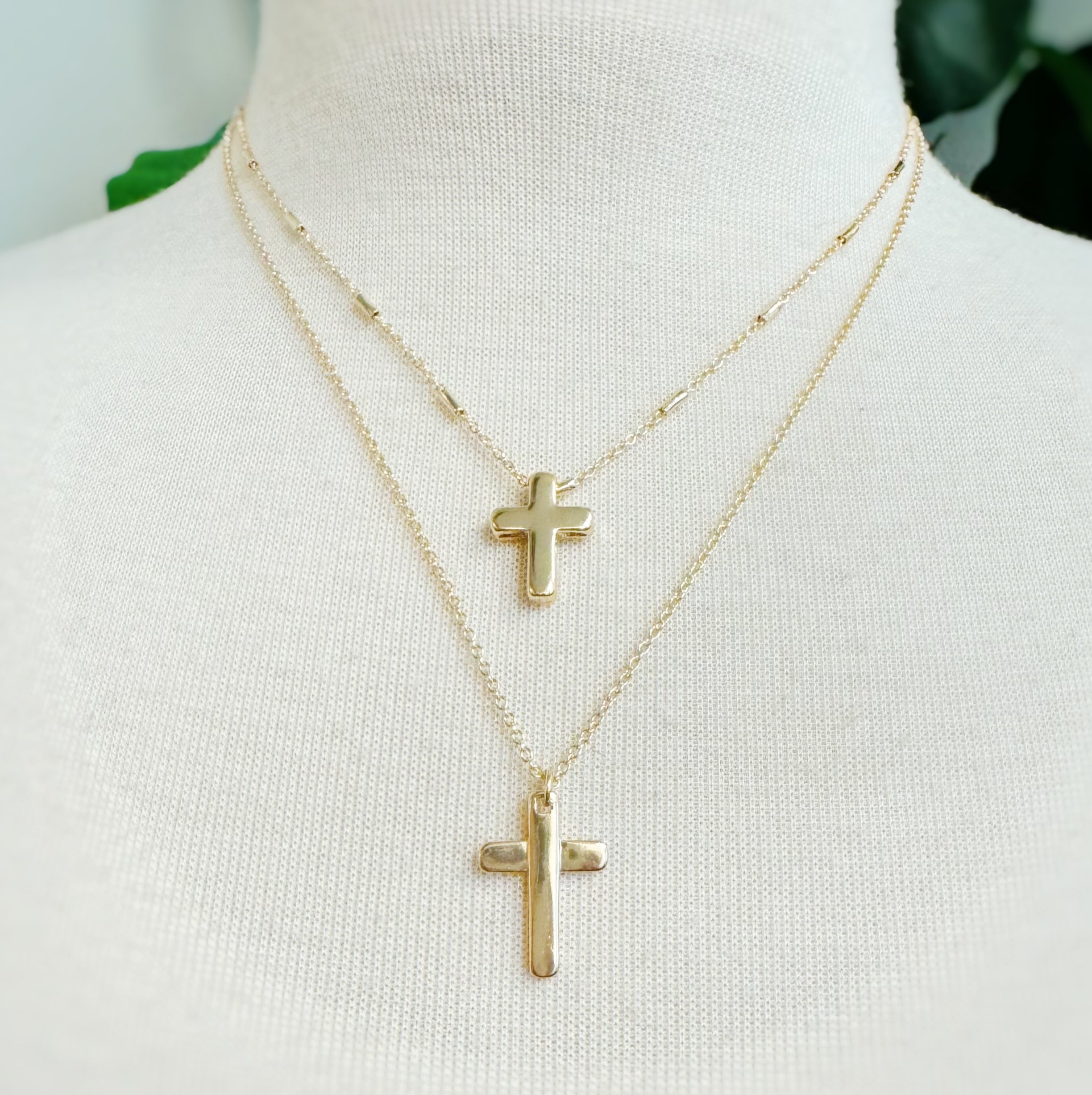 Pretty Chain Cross Necklace Set of 2 featuring modern cross designs on delicate chains, perfect for layering or solo wear.