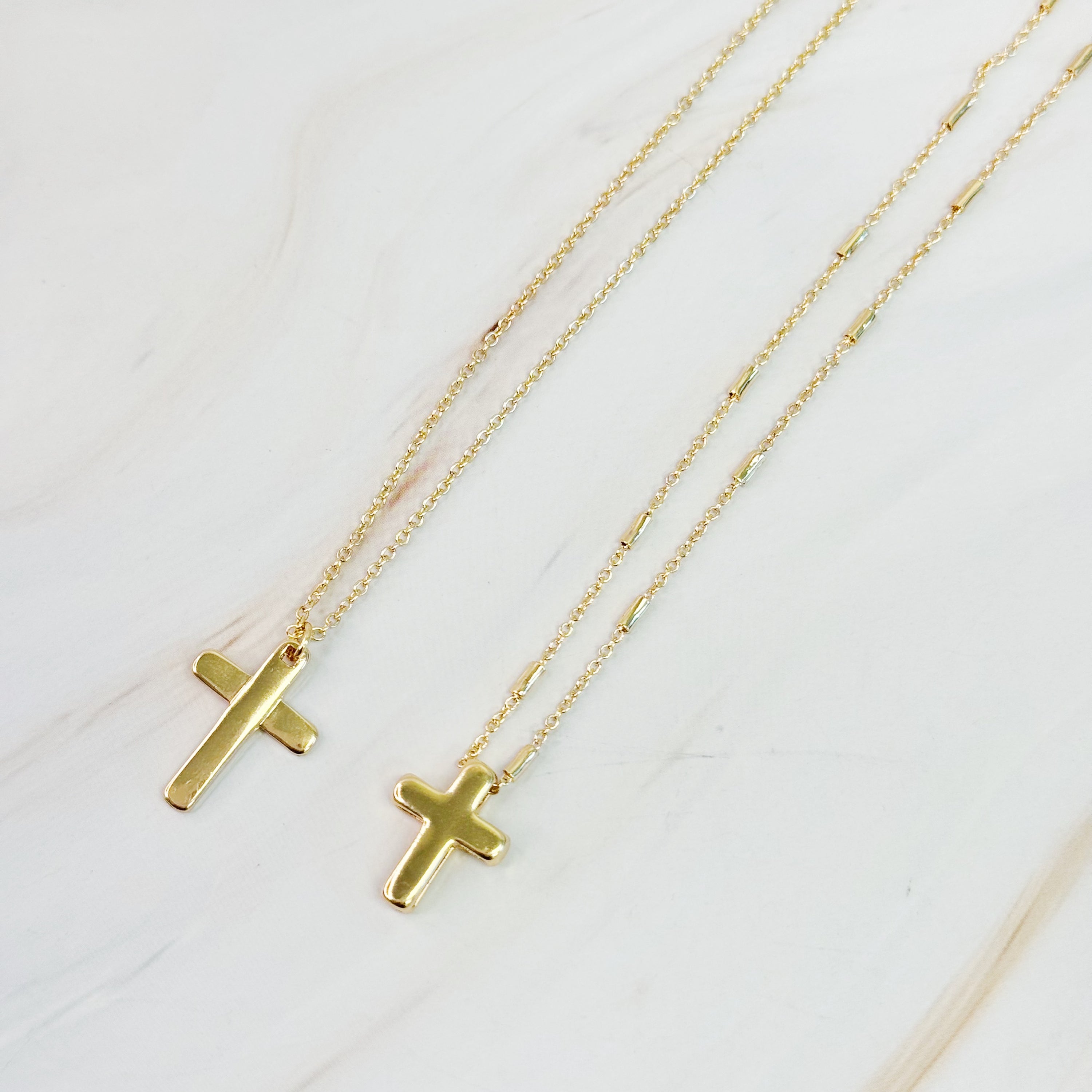Pretty Chain Cross Necklace Set of 2 featuring modern cross designs on delicate chains, perfect for layering or solo wear.