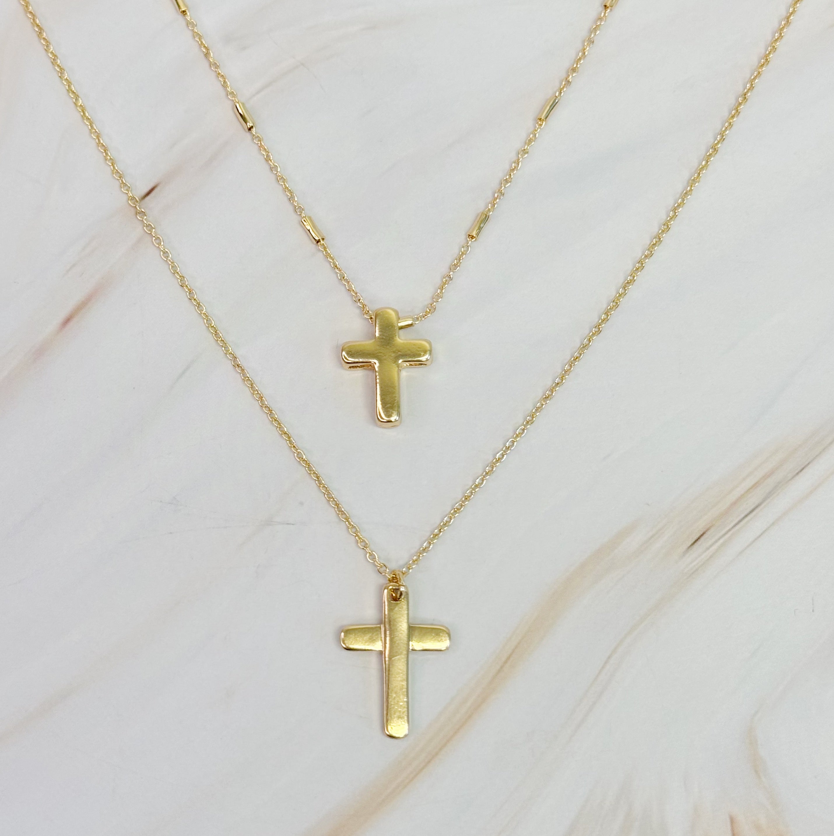 Pretty Chain Cross Necklace Set of 2 featuring modern cross designs on delicate chains, perfect for layering or solo wear.